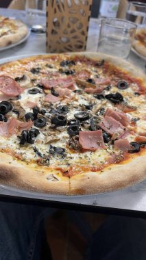 Bake homemade pizza hot from oven