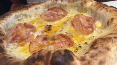 Bake homemade pizza hot from oven