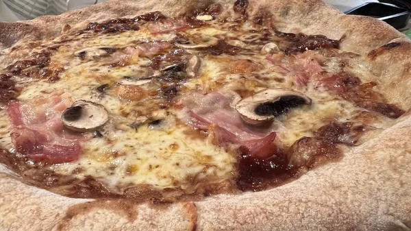 Bake homemade pizza hot from oven