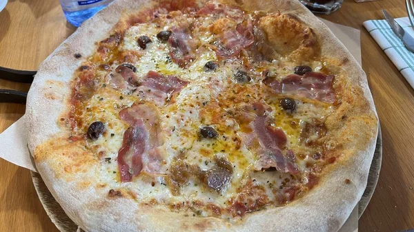 Bake homemade pizza hot from oven