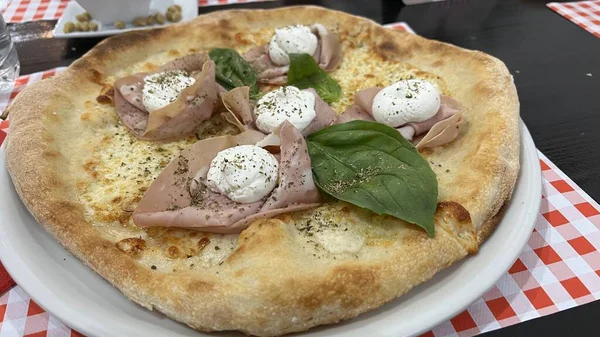 Bake homemade pizza hot from oven