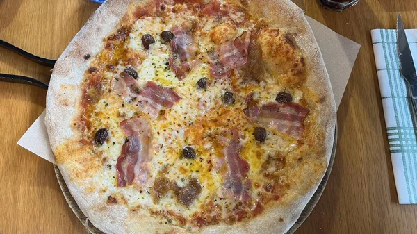 Bake homemade pizza hot from oven