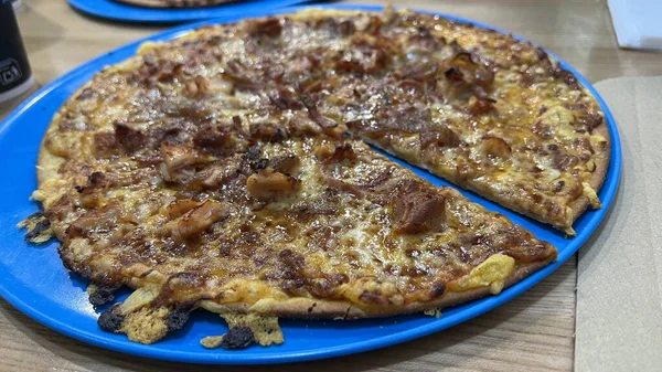 Bake homemade pizza hot from oven