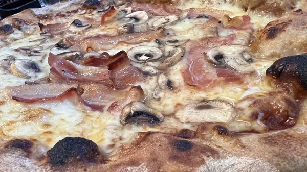 Bake homemade pizza hot from oven