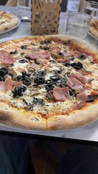 Bake homemade pizza hot from oven