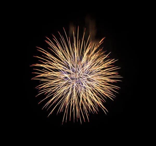 Fuegos artificiales amarillos sobre fondo negro —  Fotos de Stock