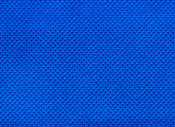 不織布又はスパンボンド生地の青色の質感の背景 — ストック写真