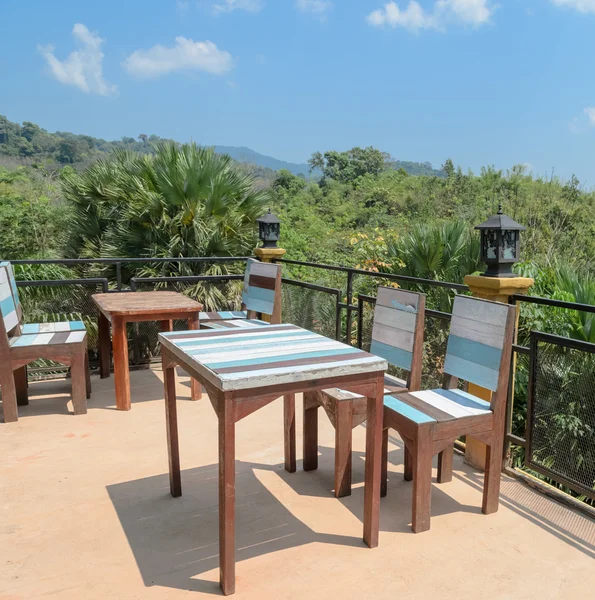 Outdoor patio furniture with mountain view — Stock Photo, Image