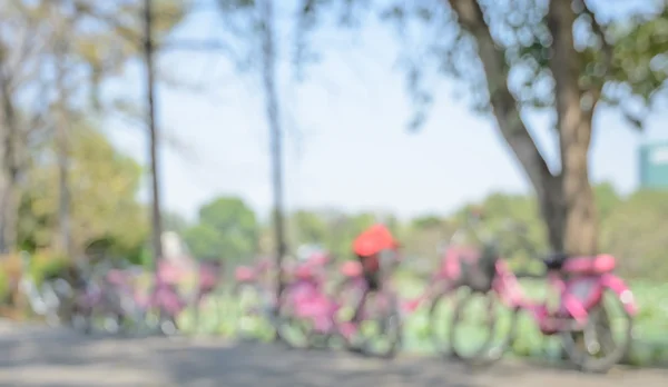 Defocused background of bicycle in the park — Stock Photo, Image