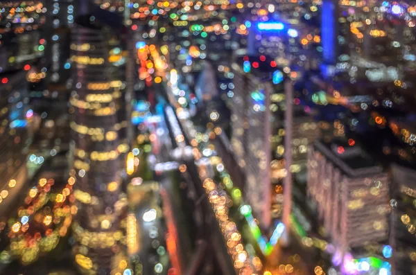 Cityscape noite luzes bokeh fundo — Fotografia de Stock