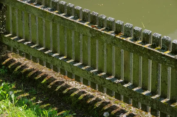 Fence near water — Stock Photo, Image