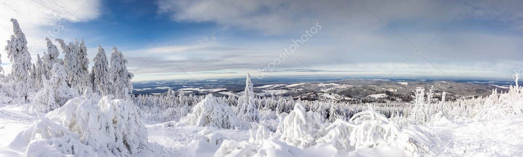 Panorama of the Taunus low mountain range in winter as seen from the Feldberg plateau, Hesse, Germany