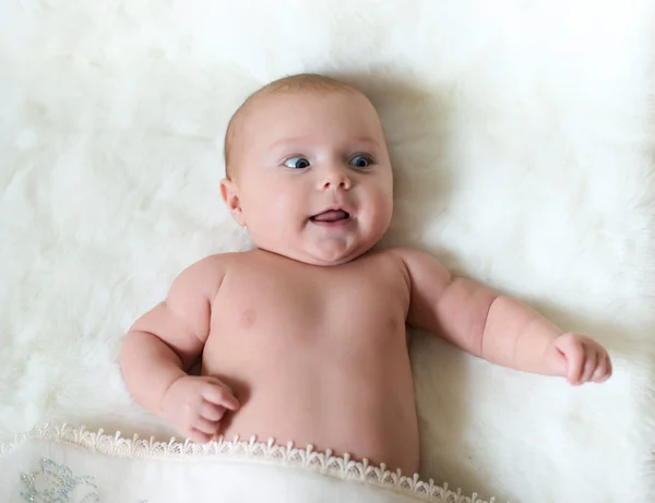 Adorable laughing baby Stock Image