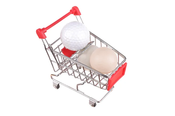 Pequeño carrito de compras aislado en blanco Imagen De Stock