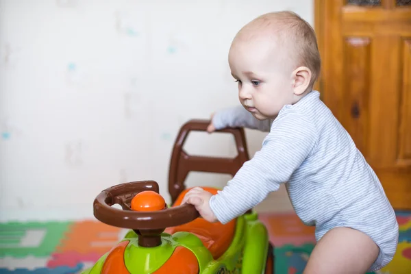 Young kid driving a race car — Stock Photo, Image