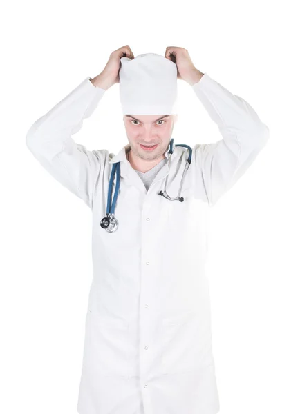 Retrato de un médico vistiéndose de uniforme. aislado sobre fondo blanco —  Fotos de Stock