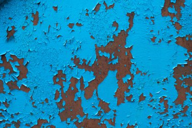 Duvardaki pürüzsüz dokudaki boyayı soyuyordum. Kırsal mavi grunge maddesi deseni.