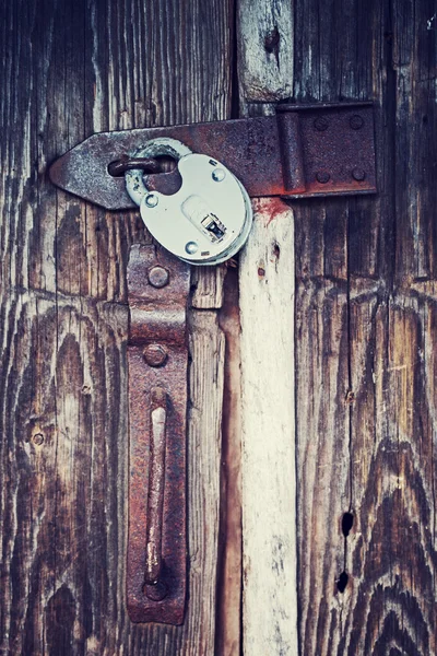 Locked wooden door — Stock Photo, Image