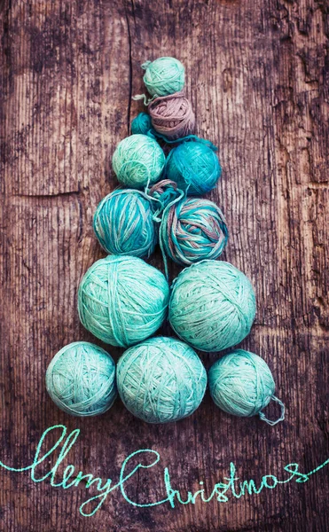 Christmas tree shaped by balls of yarn — Stock Photo, Image