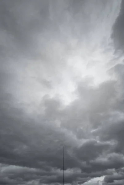 Lightning rod under dark gray stormy sky — Stock Photo, Image