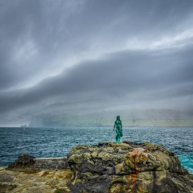 Kopakonan, the Seal Woman statue under the storm clipart