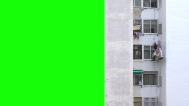 Фарбування фасадів риштування рухається вниз з хромою — стокове відео