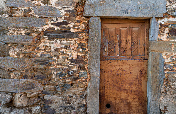 Vintage wooden door with slate jamb