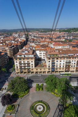 View of roofs from Getxo from Bizkaia suspension bridge clipart