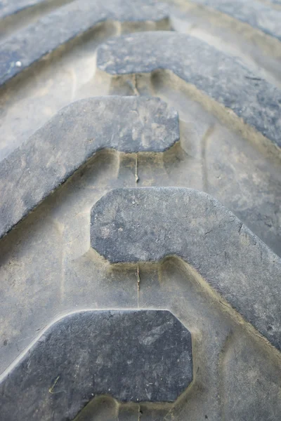 Closeup of run-down tractor tire with pattern — Stock Photo, Image