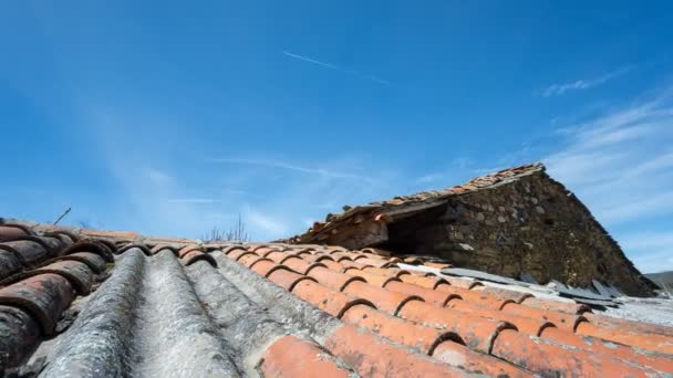 Clouds over tiled roof — Stock Video