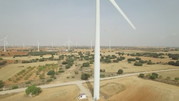 Sliding camera over wind turbine, aerial view — Stock Video
