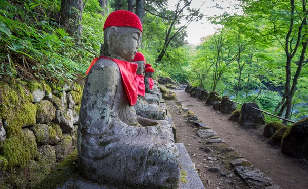 Wide angle of statues in Nikko with track — Stock Photo, Image