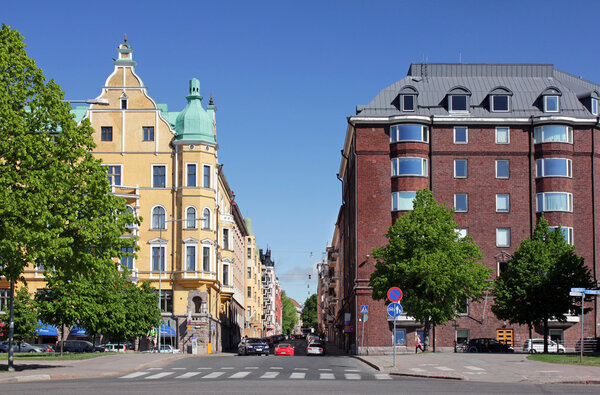 HELSINKI, FINLAND - MAY 27, 2016. Neitsytpolku street in famous Ullanlinna district of Helsinki at sunny spring day. Crossroad of Merikatu, Neitsytpolku and Puistokatu streets, May 27, 2016.