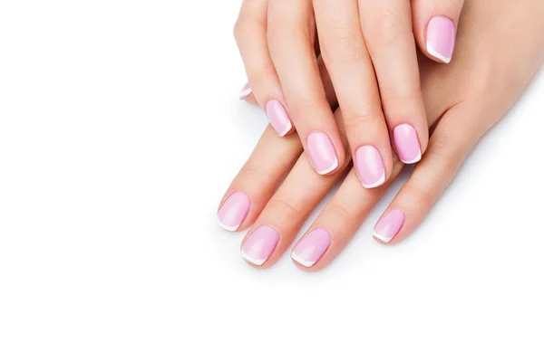 Mani donna con manicure francese — Foto Stock