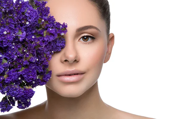 Beautiful girl with flowers — Stock Photo, Image