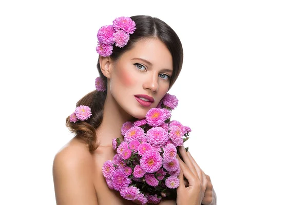 Beautiful girl with flowers — Stock Photo, Image