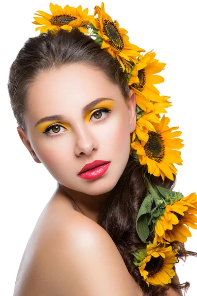 Beautiful girl with flowers in hair — Stock Photo, Image