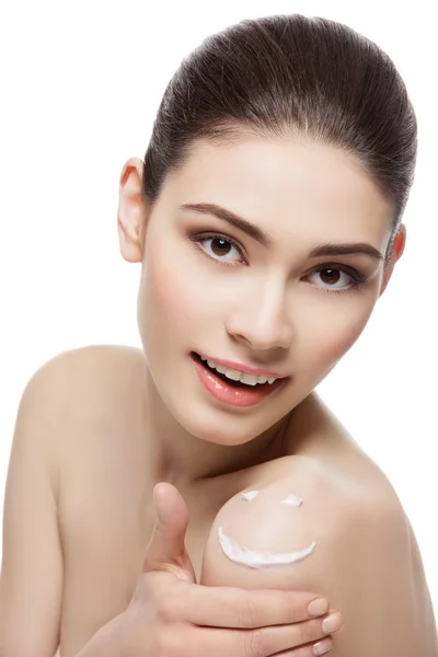 Girl with cream smiley face on shoulder — Stock Photo, Image