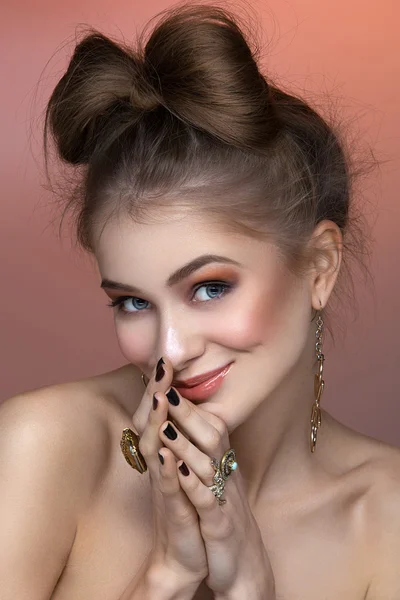 Beautiful girl with hair bow and rings — Stock Photo, Image