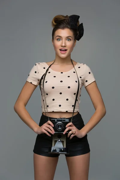 Girl with retro camera — Stock Photo, Image