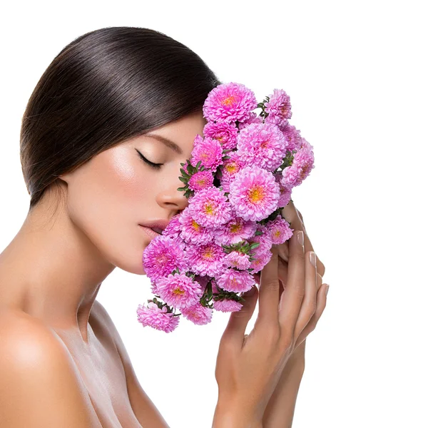 Beautiful girl with flowers — Stock Photo, Image