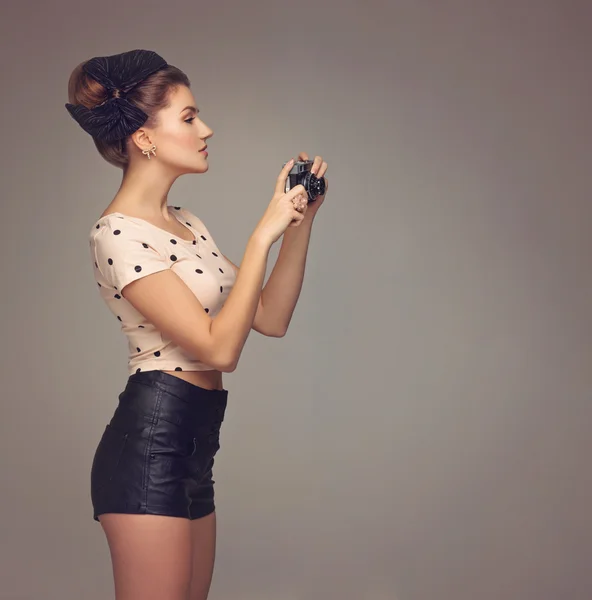 Girl with retro camera — Stock Photo, Image