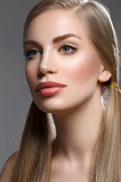 Beautiful girl with ponytails — Stock Photo, Image