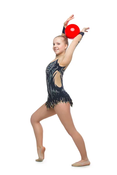 Hermosa chica gimnasta con bola roja —  Fotos de Stock