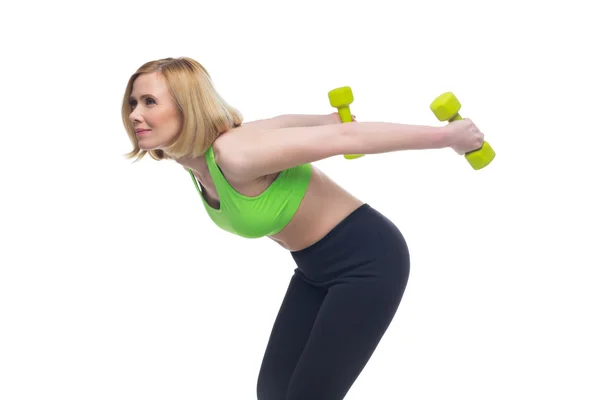 Beautiful woman doing sport exercise with dumbbells — Stock Photo, Image