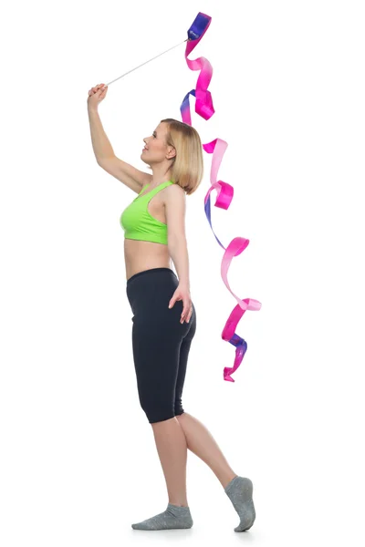 Hermosa mujer haciendo ejercicio deportivo con cinta de gimnasia — Foto de Stock