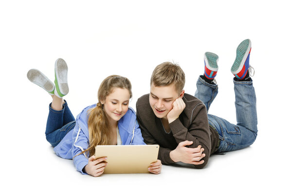 Teenage boy and girl isolated on white