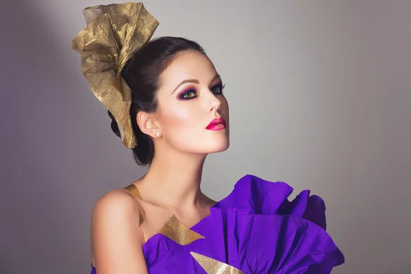 Brunette girl with purple make-up — Stock Photo, Image