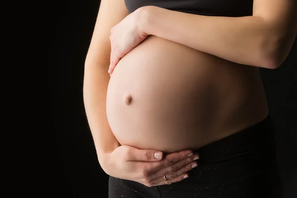 Burtă gravidă — Fotografie, imagine de stoc