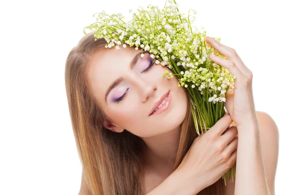 Woman with lily of the valley — Stock Photo, Image